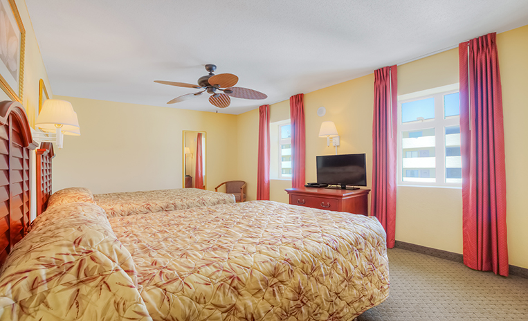 2 beds in a bedroom